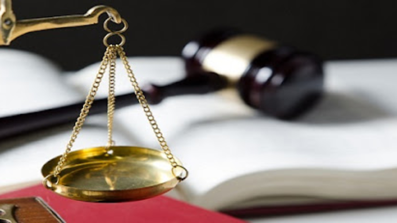 Law composition with scale and gavel on books